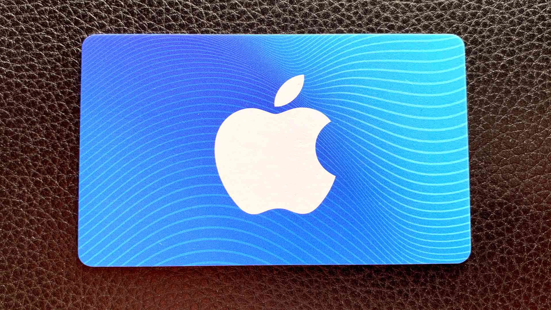 Dárková karta Apple iTunes.