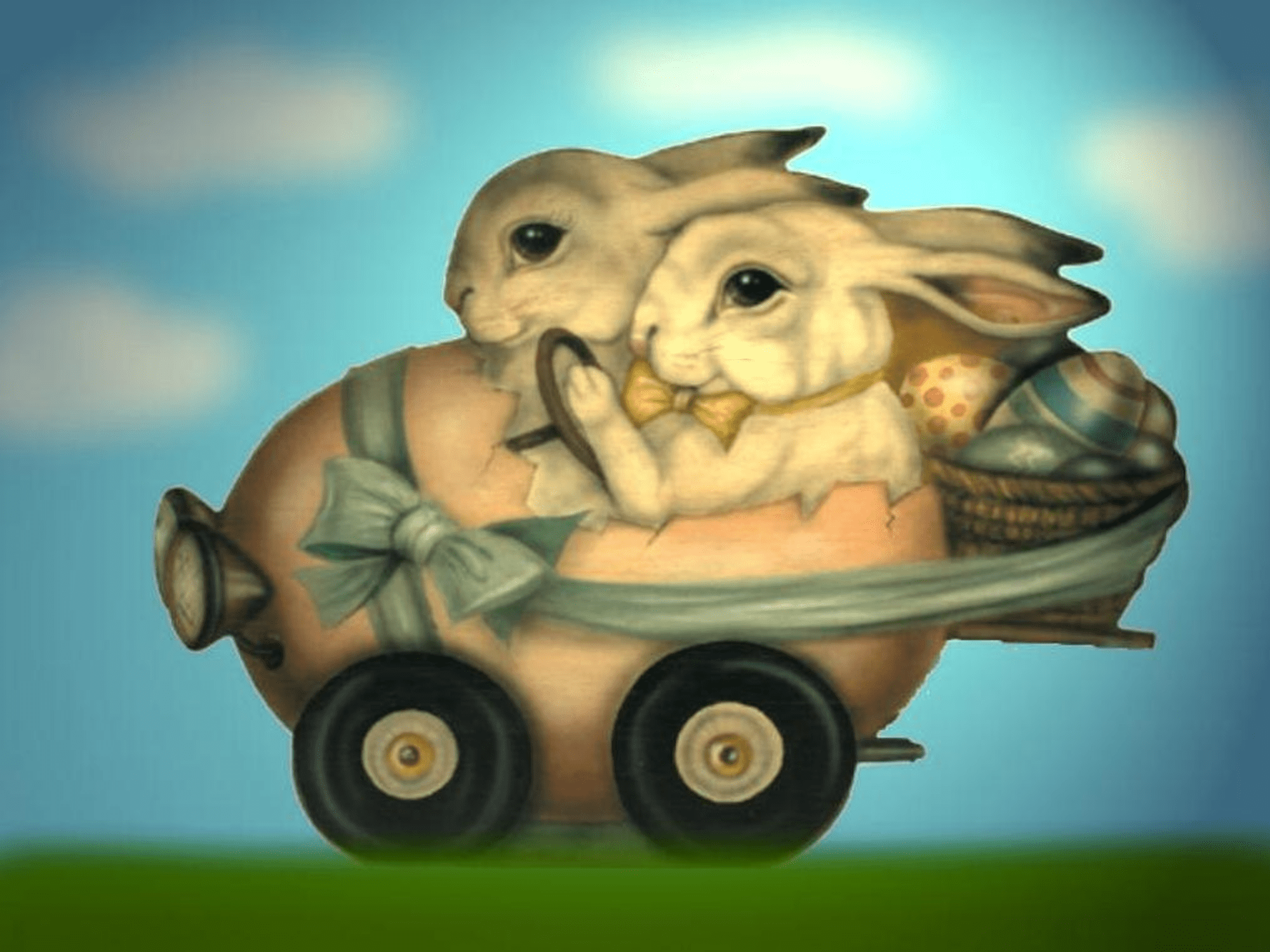 Zdarma velikonoční tapeta ze dvou králíků, kteří řídí vejce