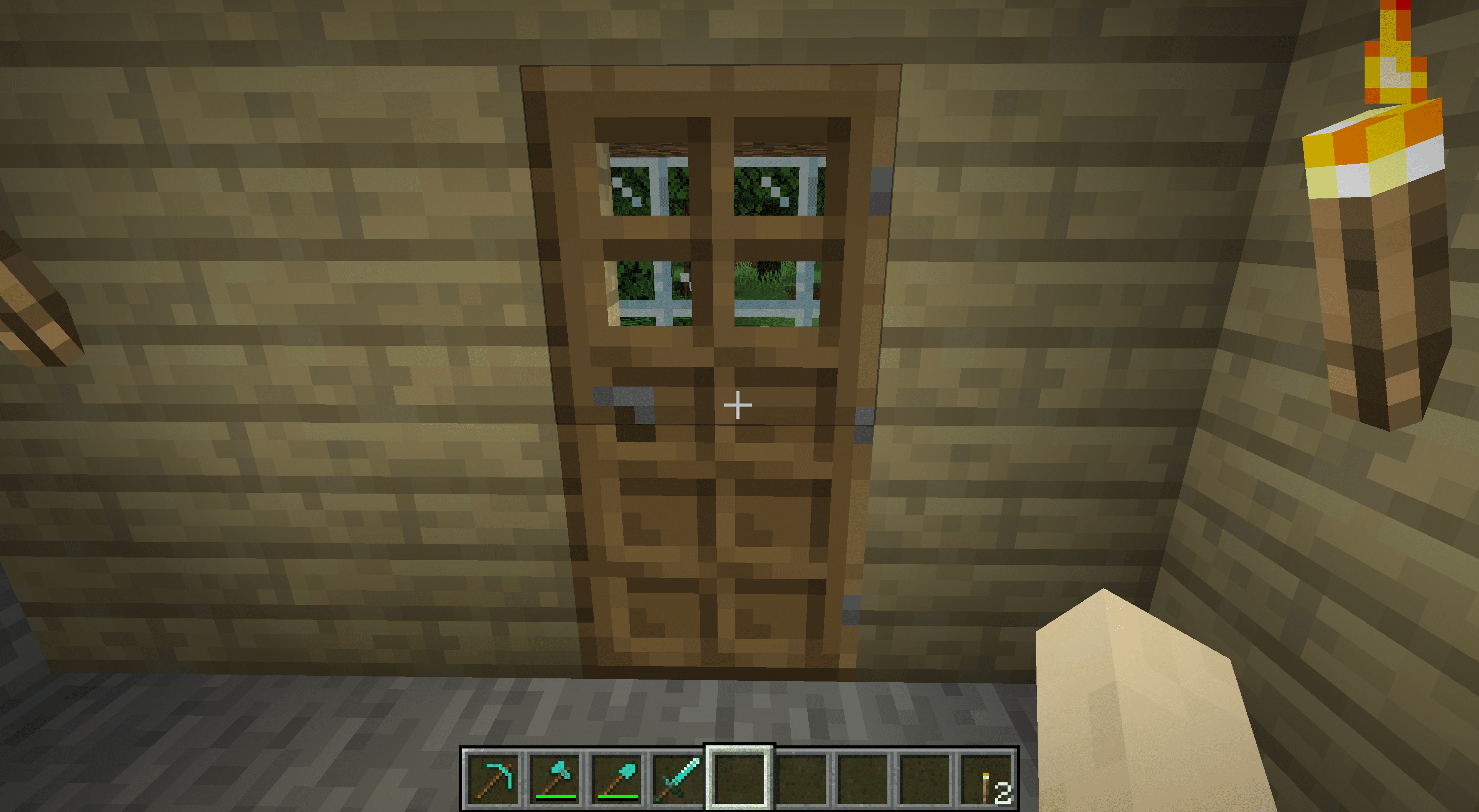 Dveře vedoucí do dolu v Minecraftu.