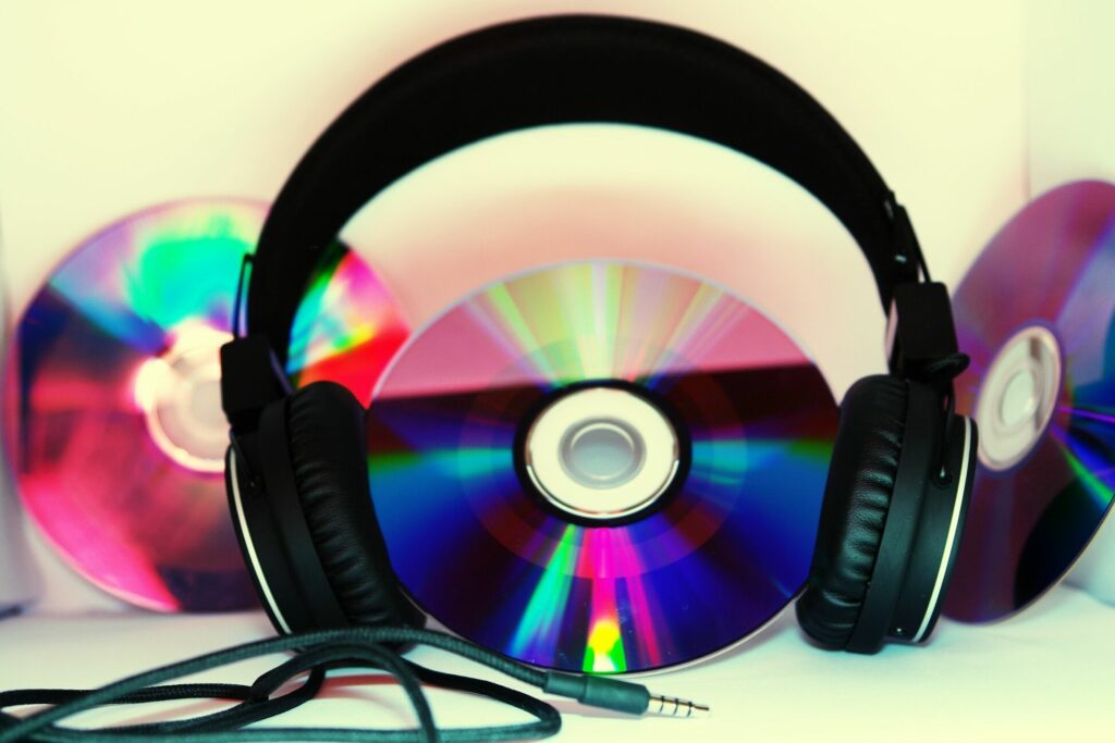 close up of dvds with headphones 667745327 5b71bd2446e0fb0050f3b248