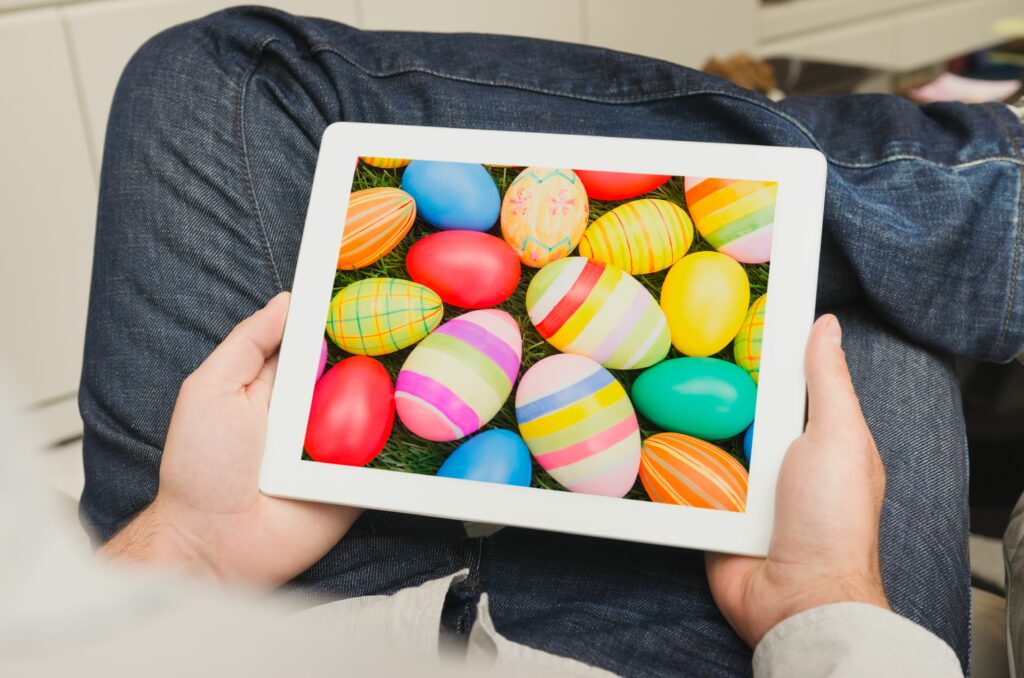 guy watching an easter images on his digital tablet 155372711 5a676e725ffa30001ac25bd9