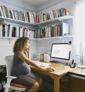 pregnant lady works from her home office 567613055 5a09ec4c494ec9003735d223
