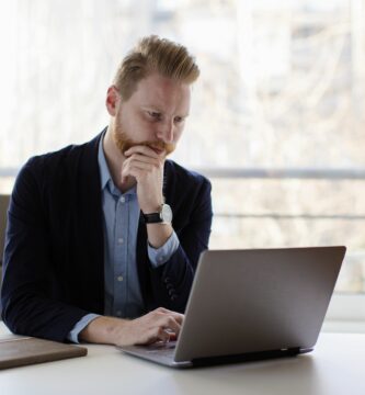 young manager reading mail at his compter 671064938 5aecf2e8a18d9e00371818d4