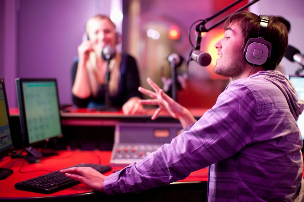 young man and woman broadcasting in recording studio 180406262 57fbcfc05f9b586c35a3d255