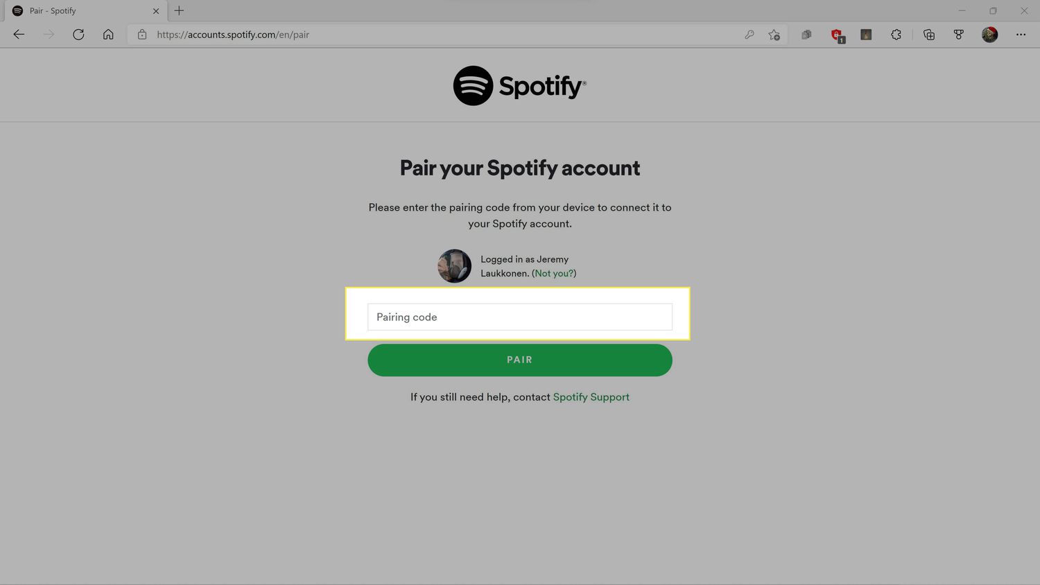 Párovací kód zvýrazněný na webu Spotify.